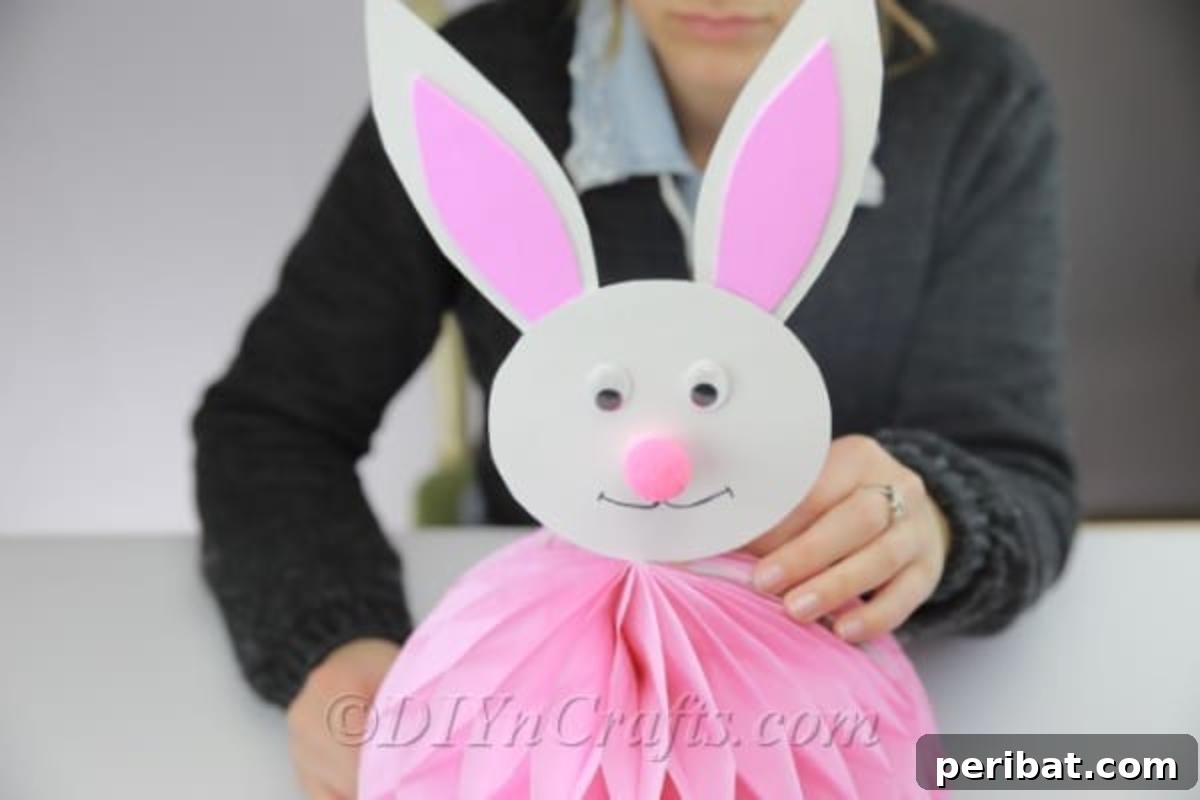 Craft an Adorable Easter Bunny from a Repurposed Party Ball 14 Insert the finished bunny head in the middle of the party ball.