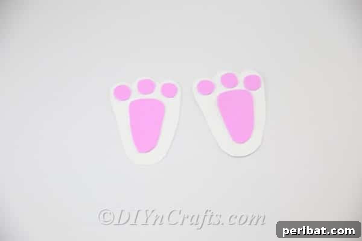 Craft an Adorable Easter Bunny from a Repurposed Party Ball 17 Cut and glue the pink paw pads onto the finished feet.