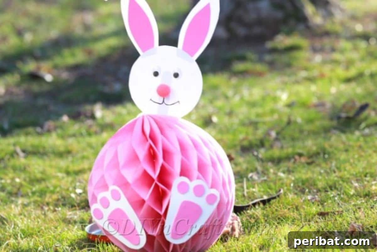 Craft an Adorable Easter Bunny from a Repurposed Party Ball 19 Finished honeycomb ball Easter bunny decoration.