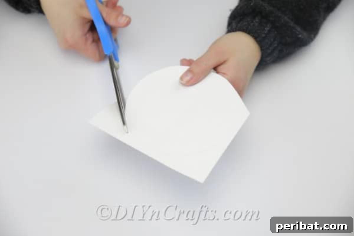 Craft an Adorable Easter Bunny from a Repurposed Party Ball 7 Cutting the circle we'll use as the head.