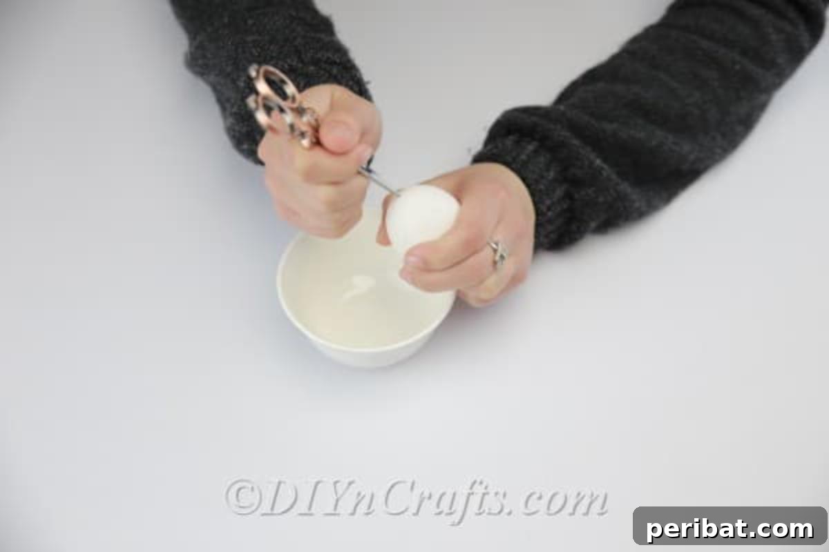 Hatch a DIY Easter Egg Planter 4 Opening the top of the egg carefully.