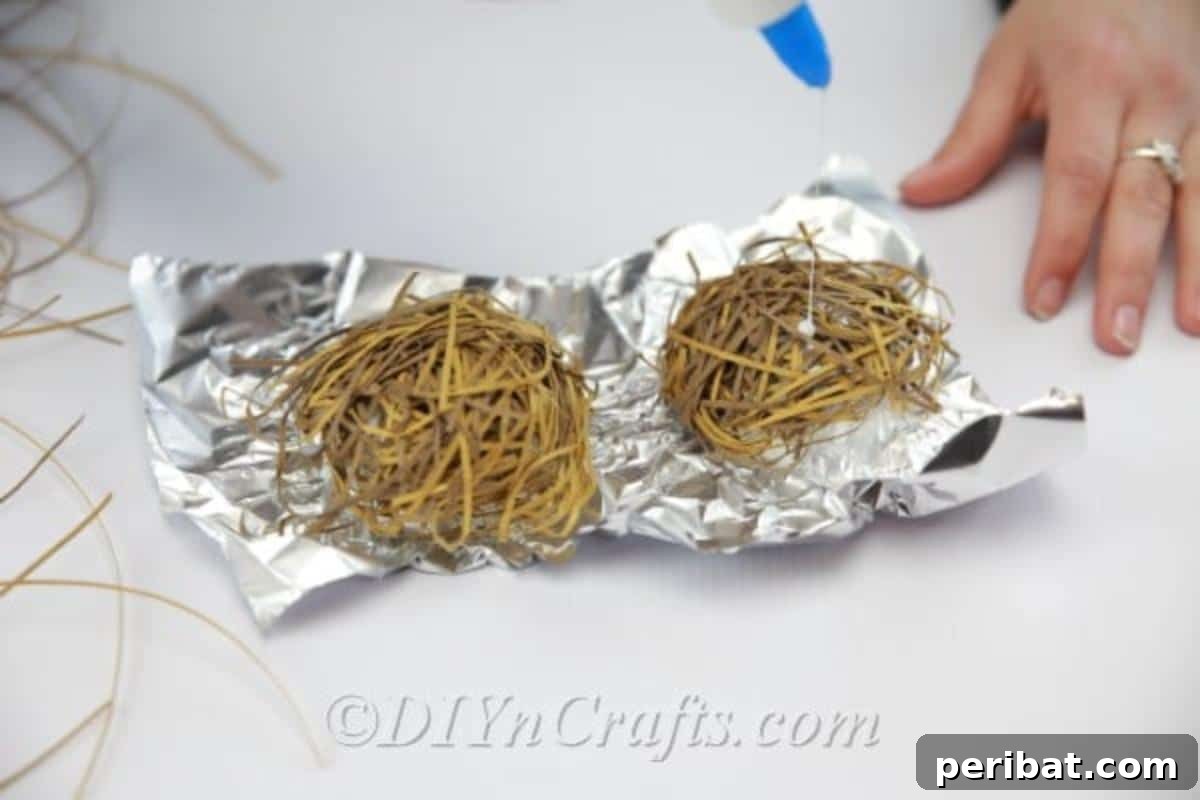 Craft a Realistic Bird Nest for Easter Treats 9 Continuing to layer and shape paper strips on the bird's nest mold