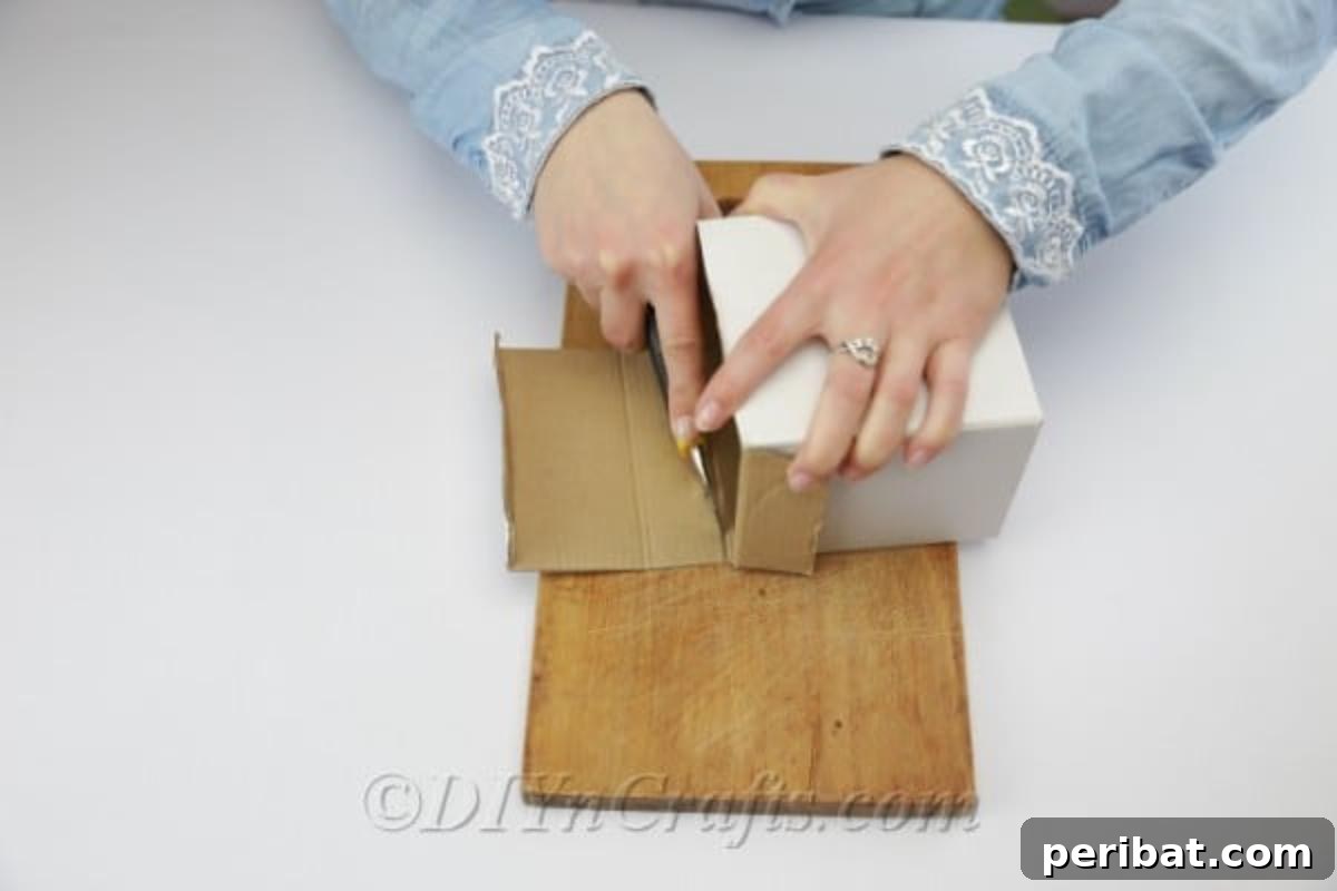 Create Beautiful Rustic Floral Displays for Easter 5 Preparing the cardboard box by carefully removing the top flaps.