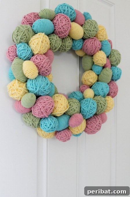 Unique Yarn Wrapped Egg Wreath Yarn Egg Wreath - 40 Creative DIY Easter Wreath Ideas to Beautify Your Home682