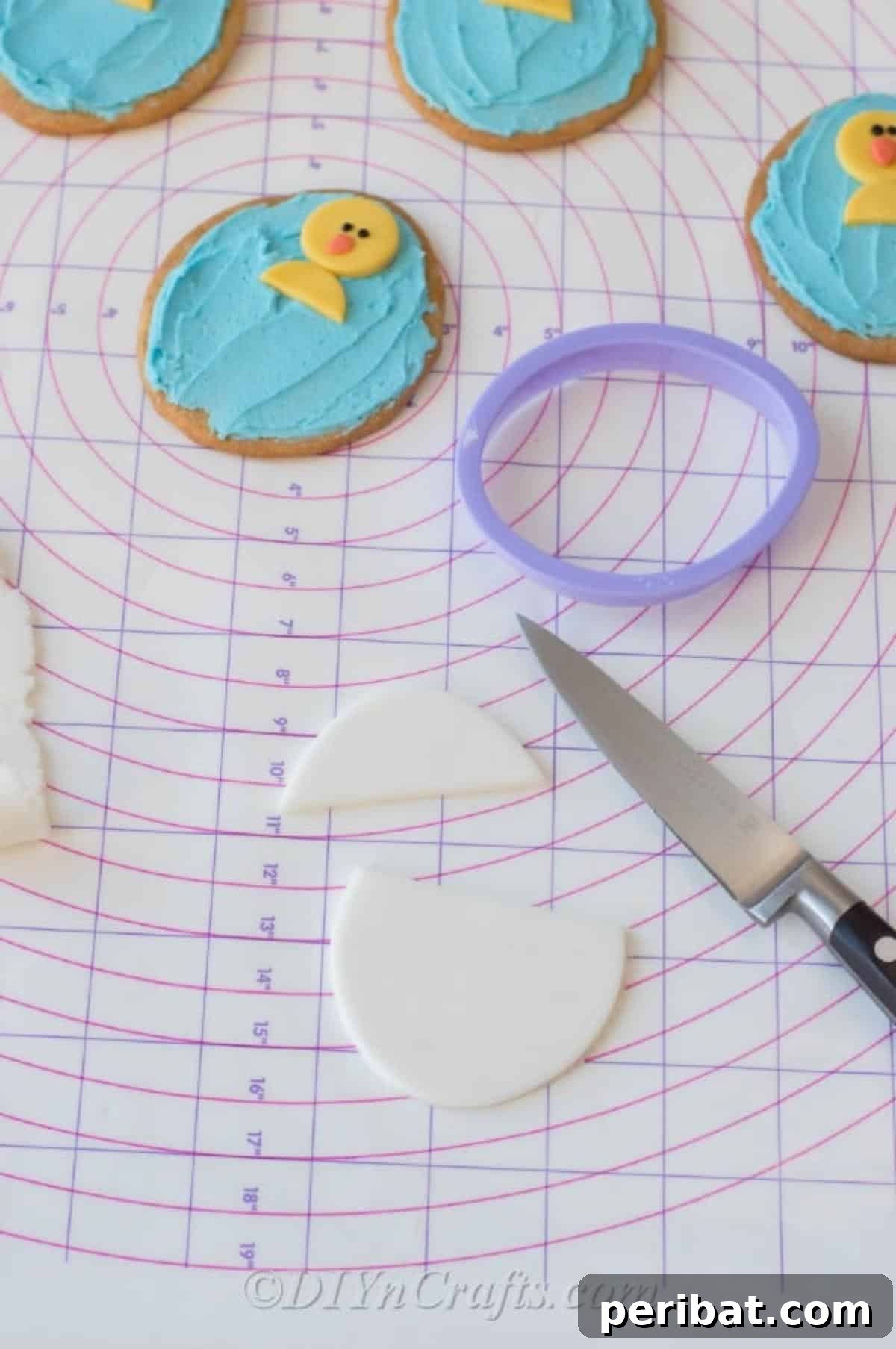 Place fondant on cookies to make chicks
