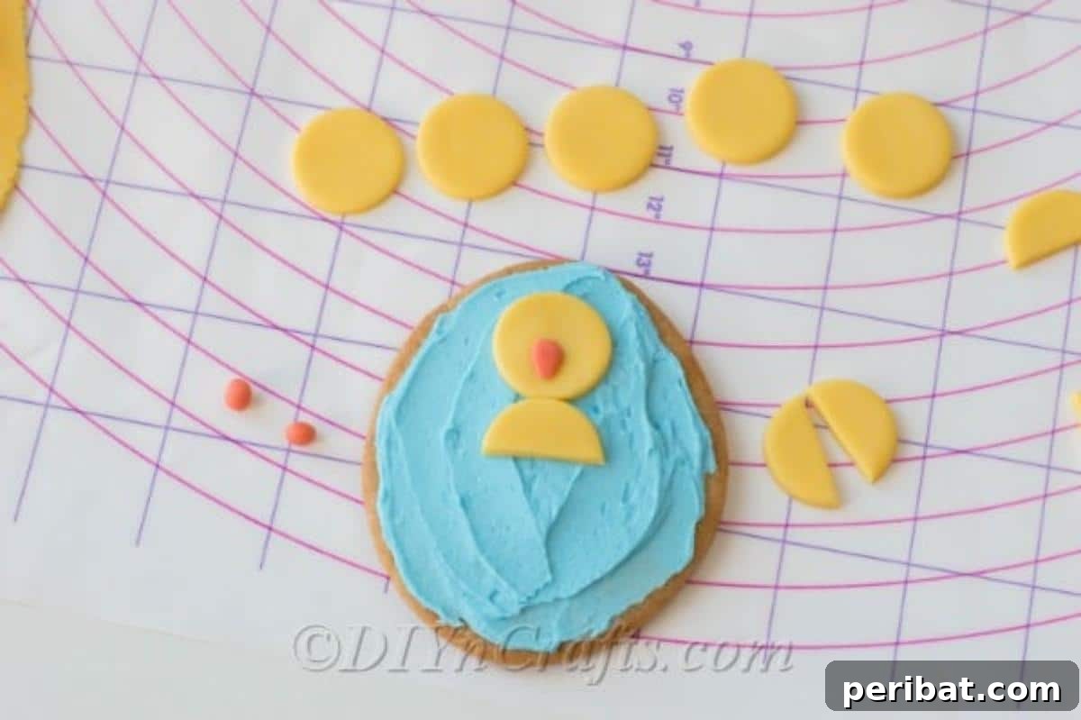 Cute fondant chick on frosted sugar cookie 