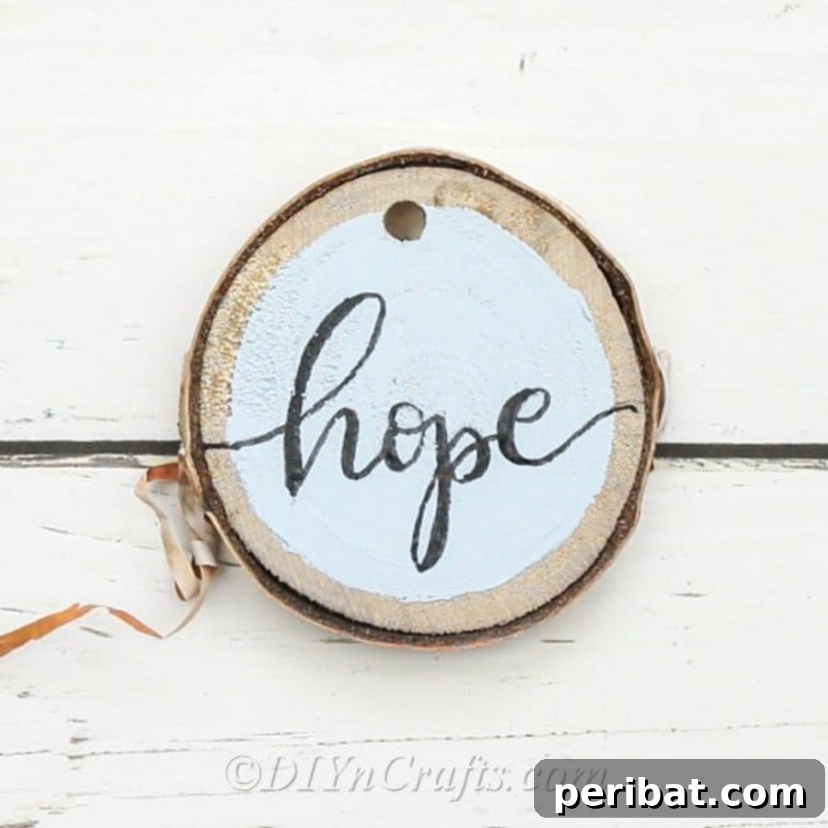 Farmhouse Hand Lettered Wood Slice Easter Decorations 10 Thickening the downstrokes of the hand-lettered words on wood slices to create a faux calligraphy effect