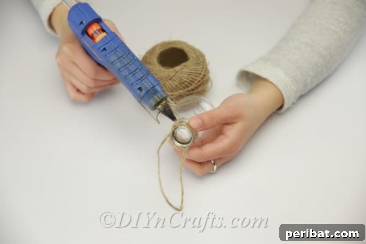 DIY Lightbulb Planter Perfect for Spring 11 Adding twine to the base of the bulb
