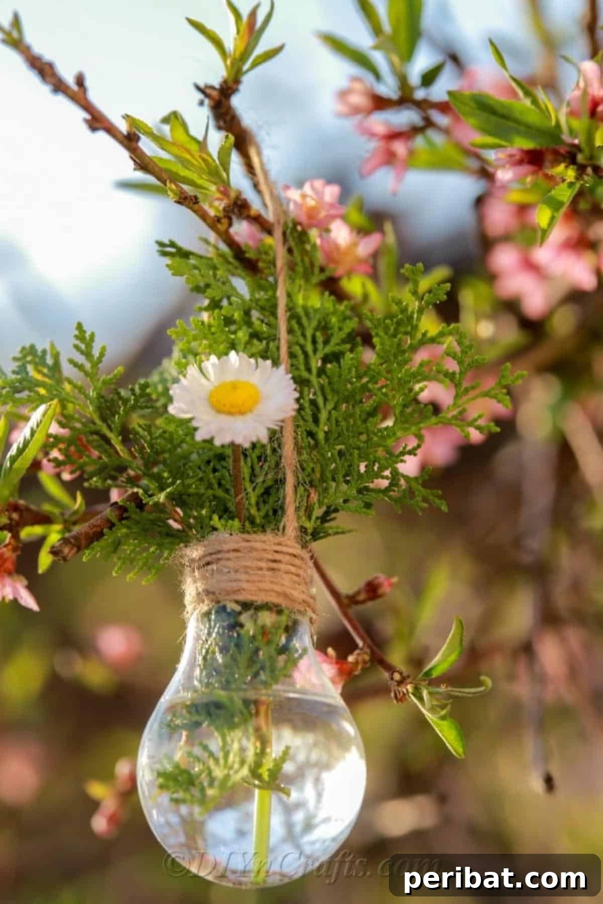 DIY Lightbulb Planter Perfect for Spring 14 Hanging lightbulb planter with flowers