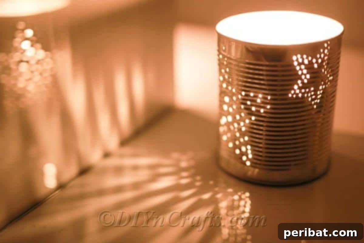 Craft Stunning Lights from Upcycled Tin Cans 4 Top view of a completed tin can luminary, highlighting the decorative hole pattern and sturdy structure.