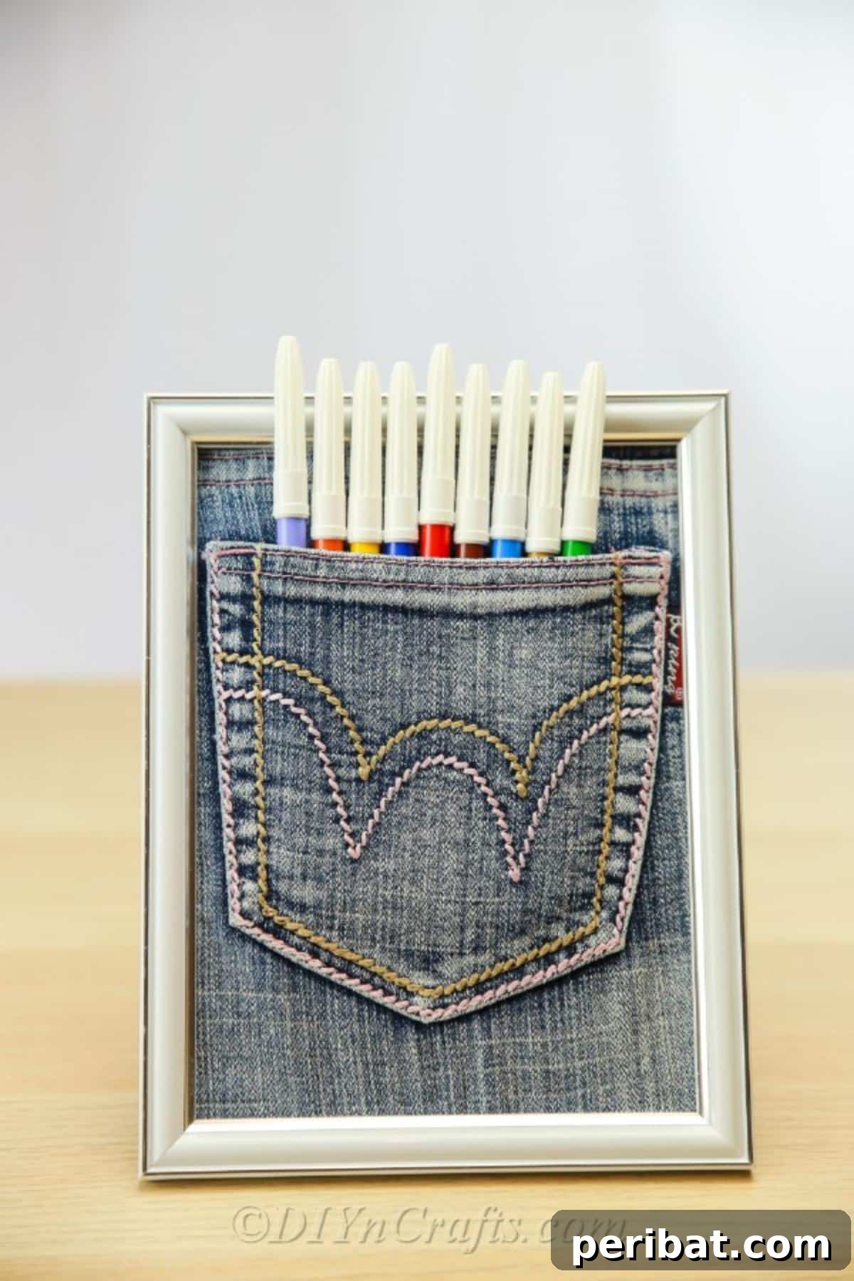 Close-up of a completed pen pocket made out of old jeans