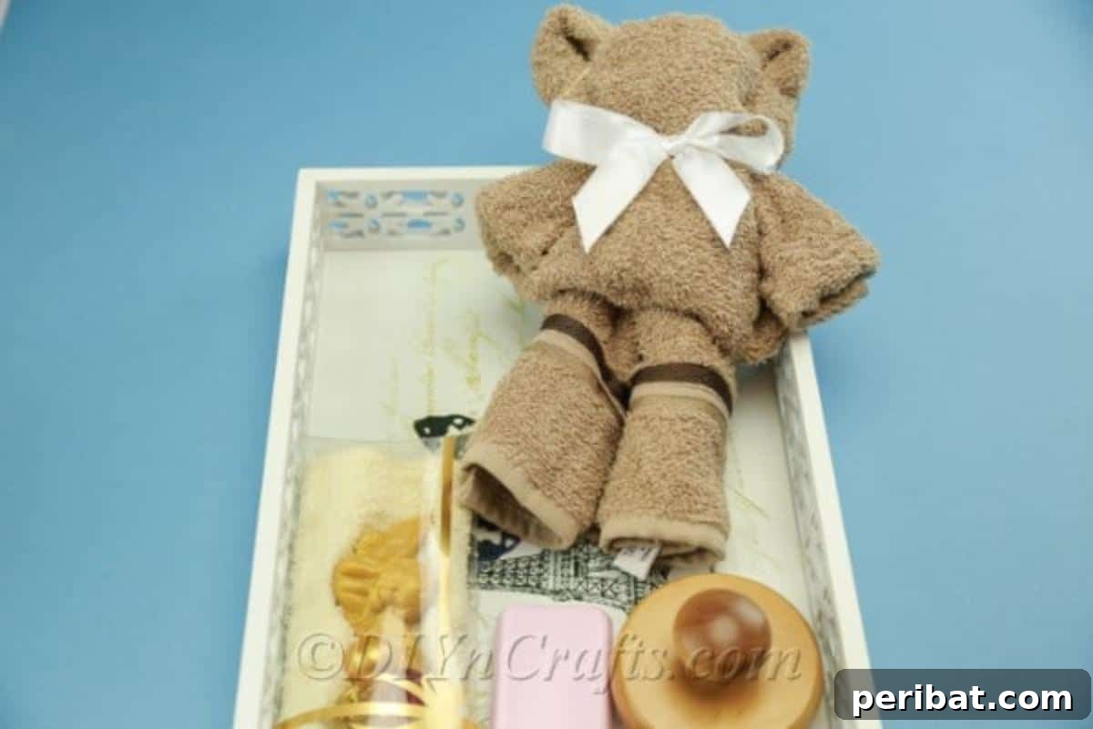 Craft a Cuddly Washcloth Bear 15 A charming washcloth teddy bear nestled in a basket, ideal for a baby shower gift