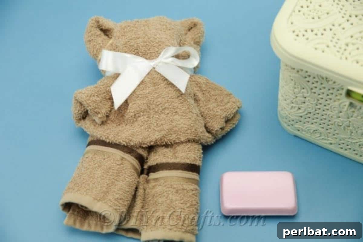 Craft a Cuddly Washcloth Bear 5 DIY teddy bear made from a washcloth, ready for gifting