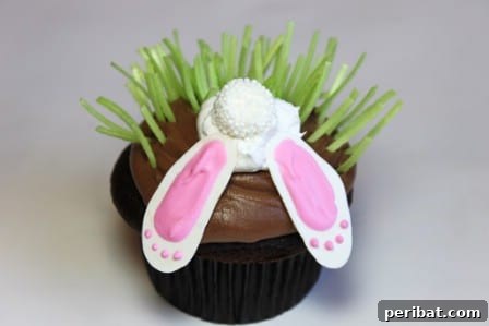 Delightful Easter Treats Made Easy 39 Adorable Shy Bunny Cupcakes with their heads in edible 'dirt'