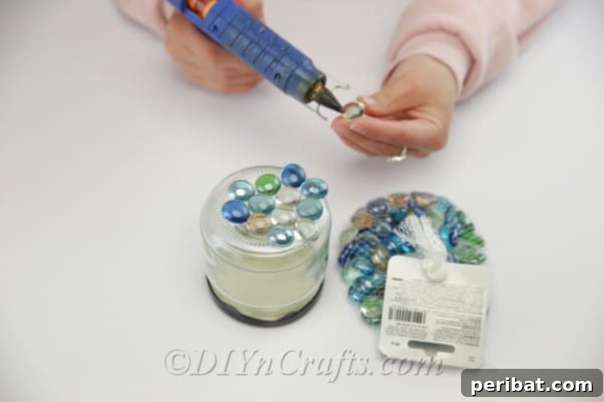 DIY Enchanted Garden Jars 6 Gluing glass stones onto glass jars