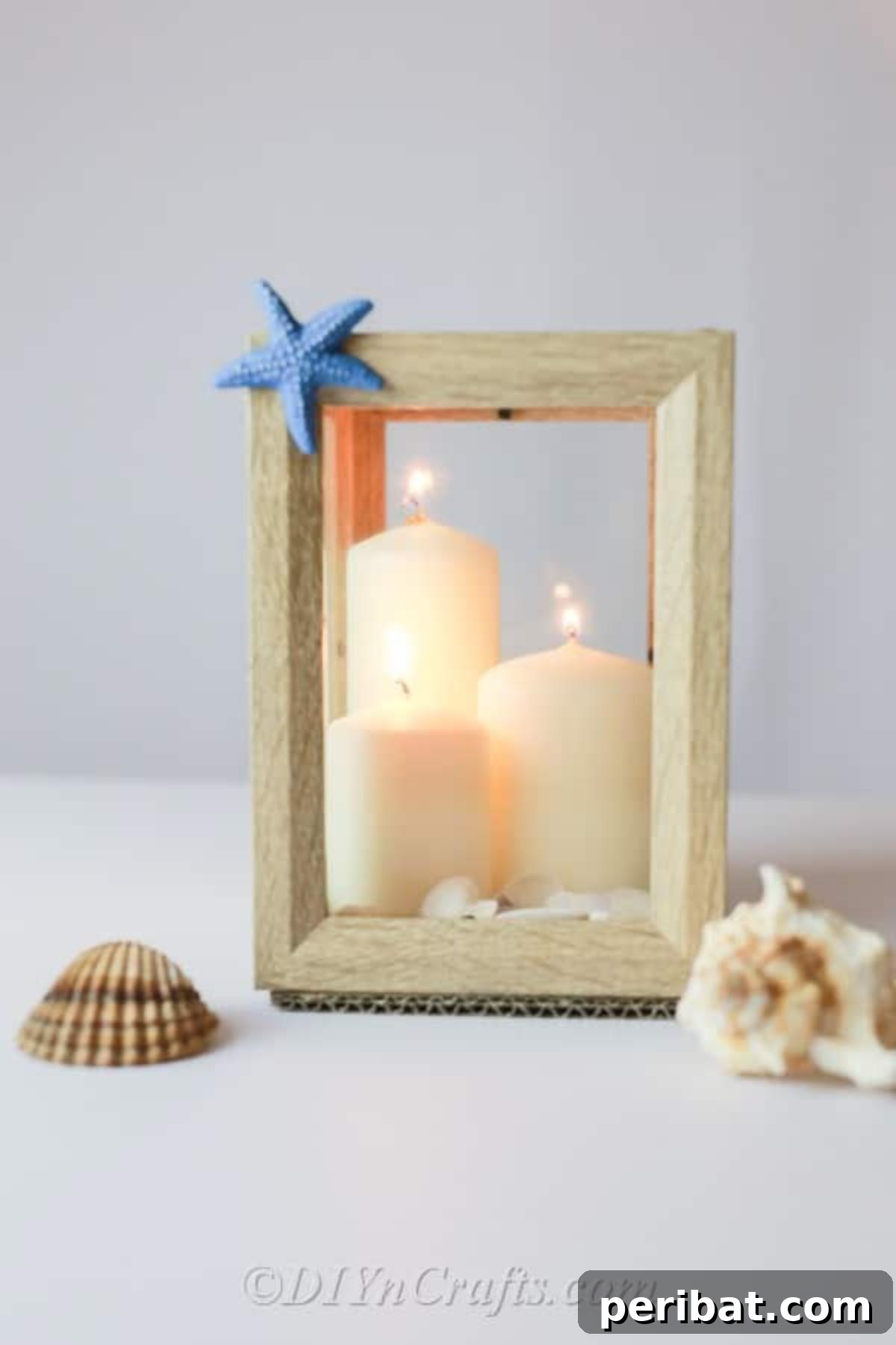 Lantern with candles and shells display