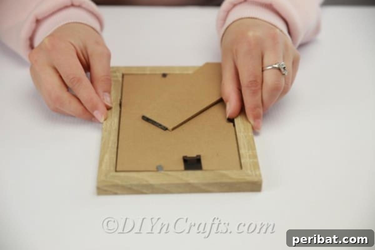 Removing backs and glass from picture frames for DIY lantern