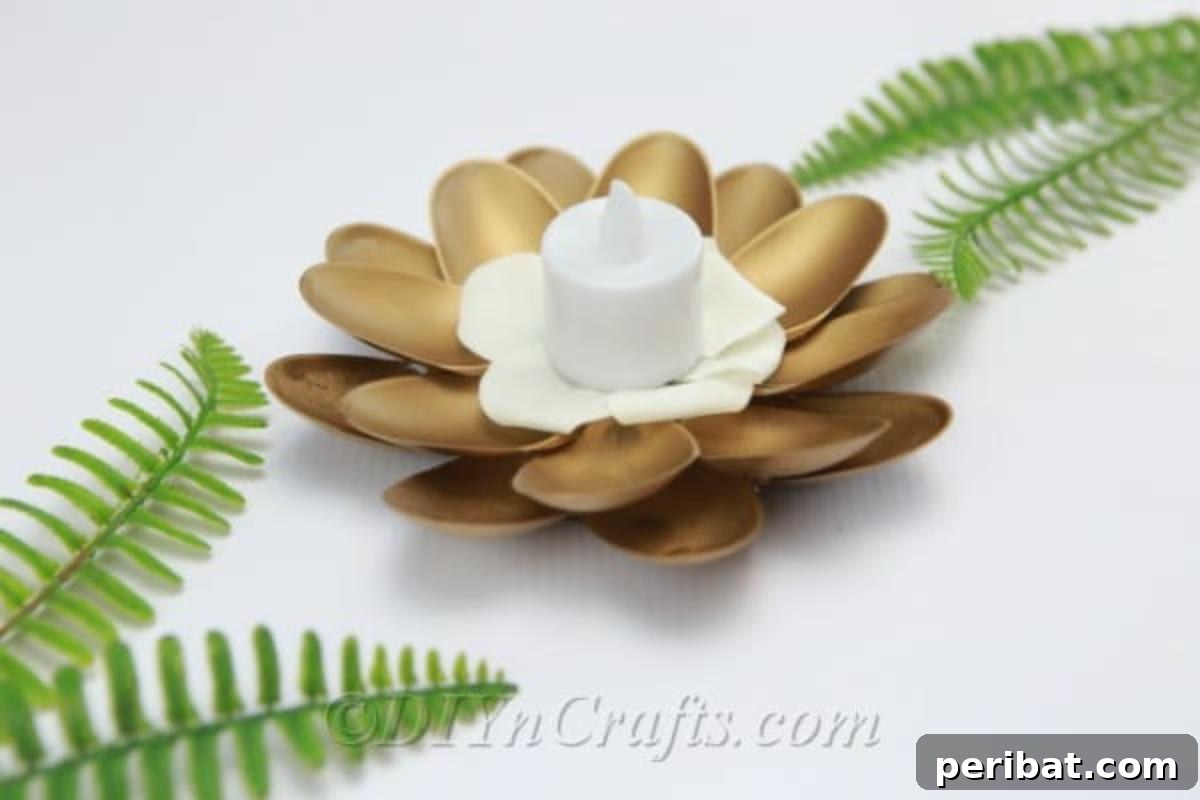 Finished DIY plastic spoon candle holder ready for display