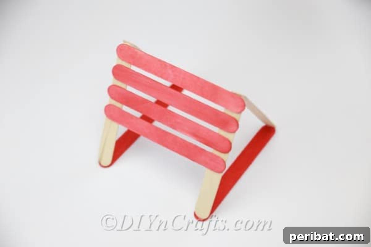 Stick-tacular Creations: 3 Crafts for Every Generation 10 Finished DIY popsicle stick earring holder, ready for earrings