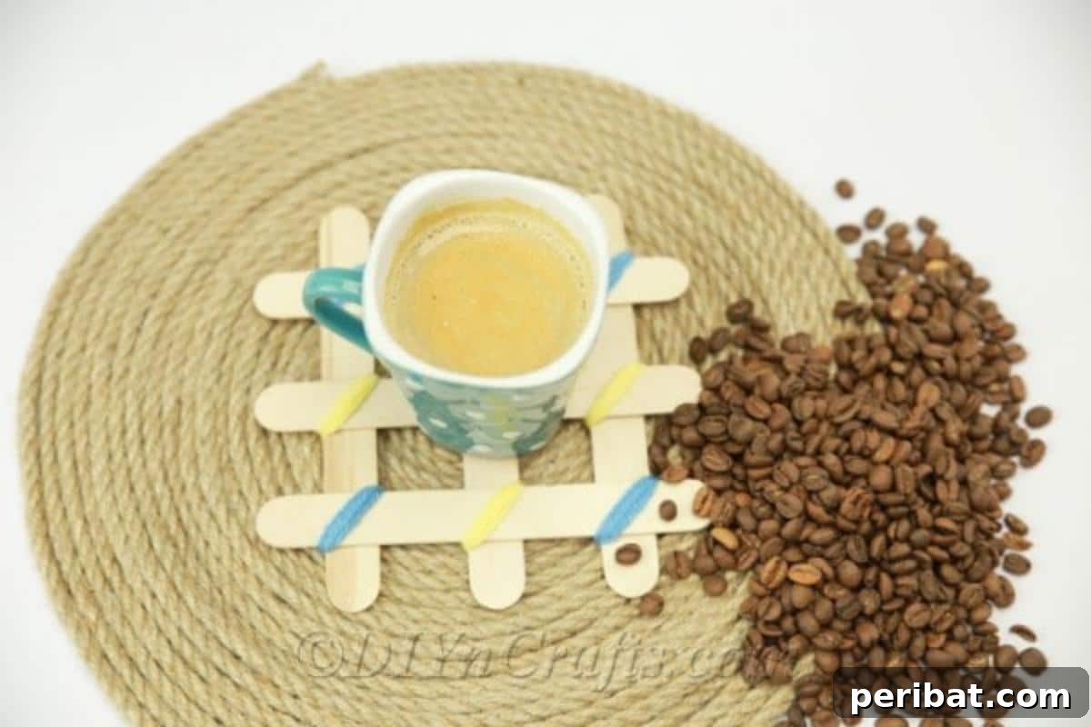Stick-tacular Creations: 3 Crafts for Every Generation 17 Finished popsicle stick coaster with yarn accents
