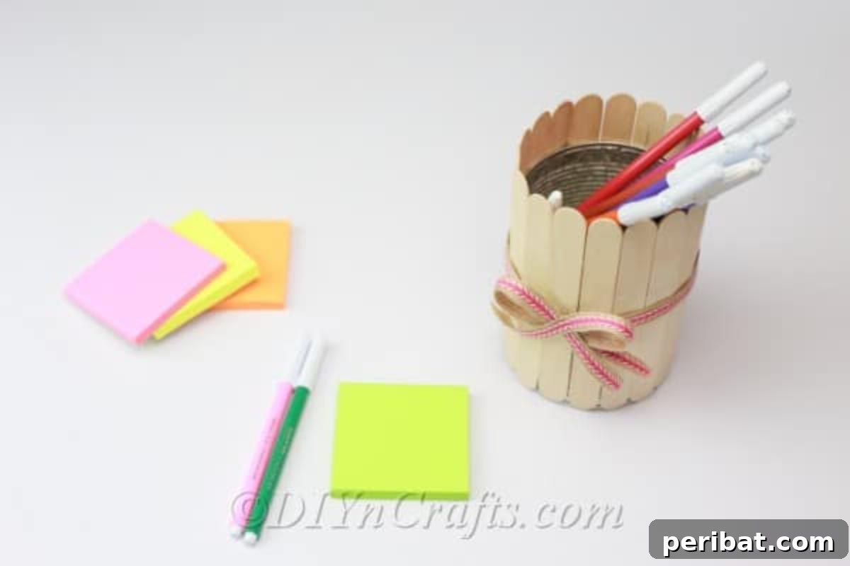 Stick-tacular Creations: 3 Crafts for Every Generation 3 Popsicle stick pencil holder on a desk with pencils