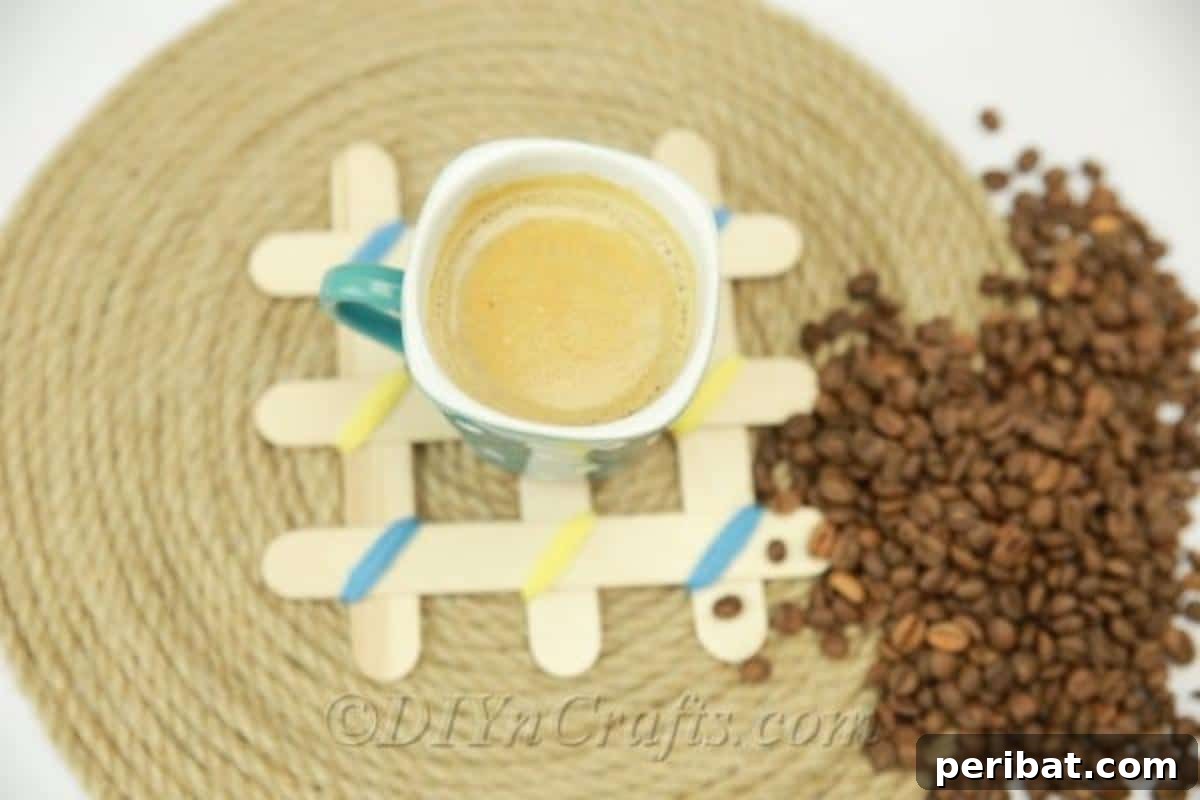 Stick-tacular Creations: 3 Crafts for Every Generation 5 Coaster made from woven popsicle sticks with yarn accents