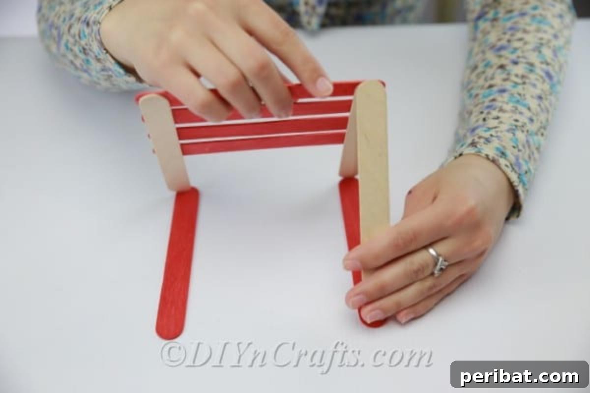 Stick-tacular Creations: 3 Crafts for Every Generation 9 Assembling a triangular stand for the popsicle stick earring holder