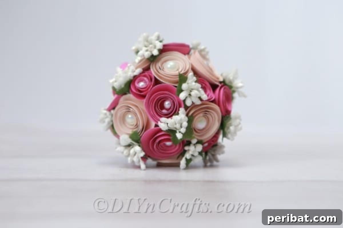 A decorative floral ball, ideal for weddings, special events, or elegant home styling.