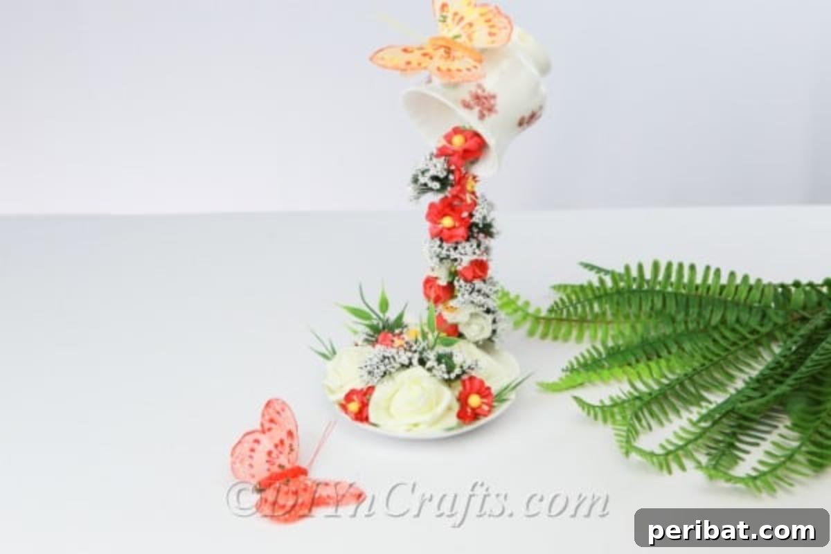 Craft a Magical Floating Teacup Ornament 3 Close-up of a floating teacup display with flowers flowing downwards
