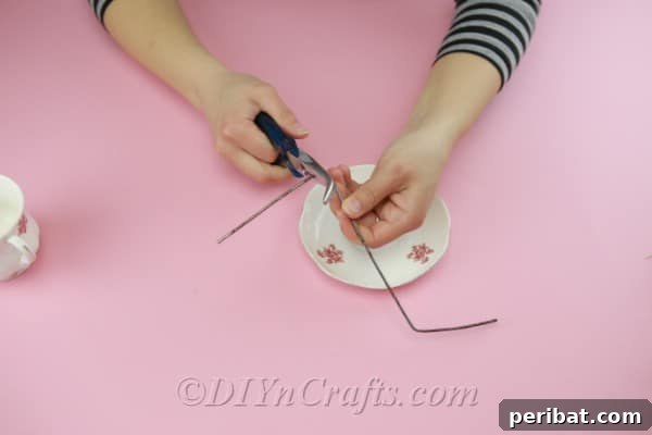 Craft a Magical Floating Teacup Ornament 7 Illustrating the process of folding the wire into a 'Z' shape