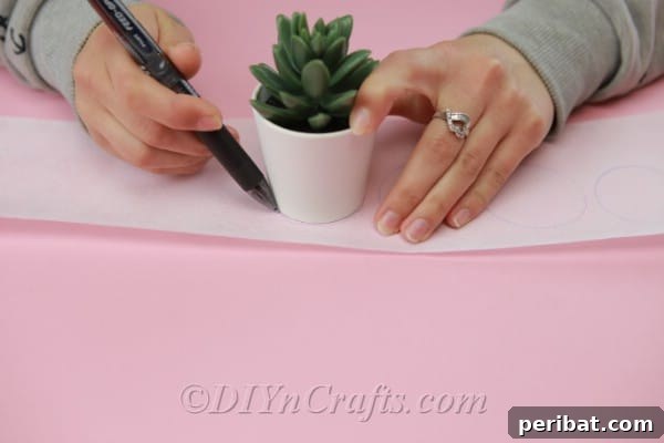 Scissors meticulously cutting out fabric circles, demonstrating the precise action required for creating neat and symmetrical flower components.