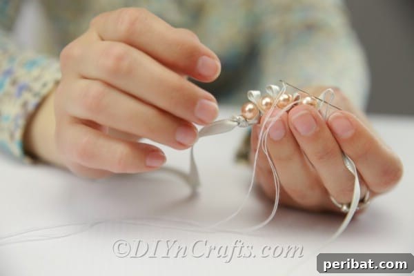 Crafting a Pearl and Ribbon Bracelet 11 Finishing up adding pearls to the satin ribbon