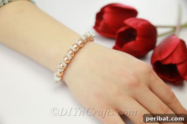 Crafting a Pearl and Ribbon Bracelet 12 Pearl and ribbon bracelet being worn