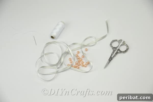 Supplies needed to make a ribbon and pearl bracelet