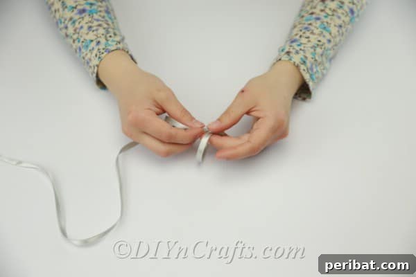 Crafting a Pearl and Ribbon Bracelet 7 Measuring the ribbon to make a bracelet