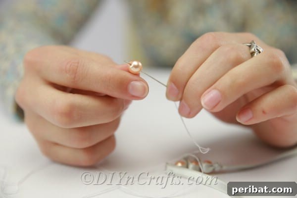Crafting a Pearl and Ribbon Bracelet 10 Sewing a pearl onto a satin bracelet