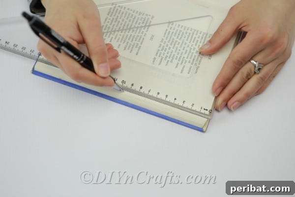 Illustrating how to measure and make marks on book pages with a ruler for the folding pattern.