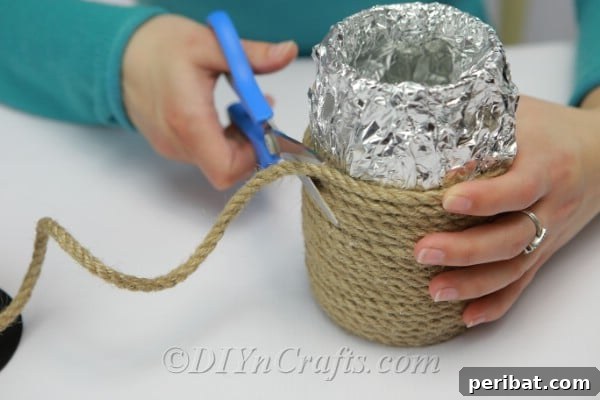 DIY Rope Baskets Elevate Your Storage Style 10 Neatly cutting the end of the rope after reaching the desired basket height and securing it with glue.