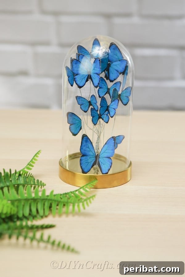 Crafting an Enchanting Butterfly Jar Terrarium 16 A completed DIY butterfly jar, with blue paper butterflies gracefully arranged inside.