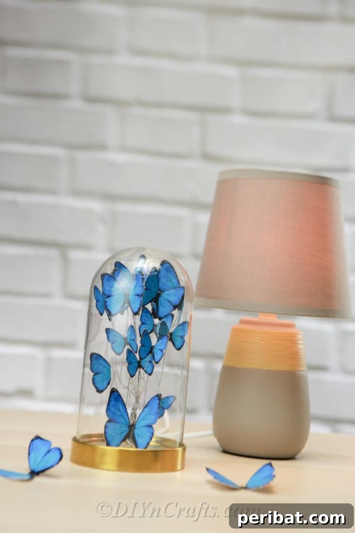 Crafting an Enchanting Butterfly Jar Terrarium 4 A top-down perspective of a beautifully crafted jar, brimming with an assortment of vibrant blue paper butterflies, ready to adorn any space.
