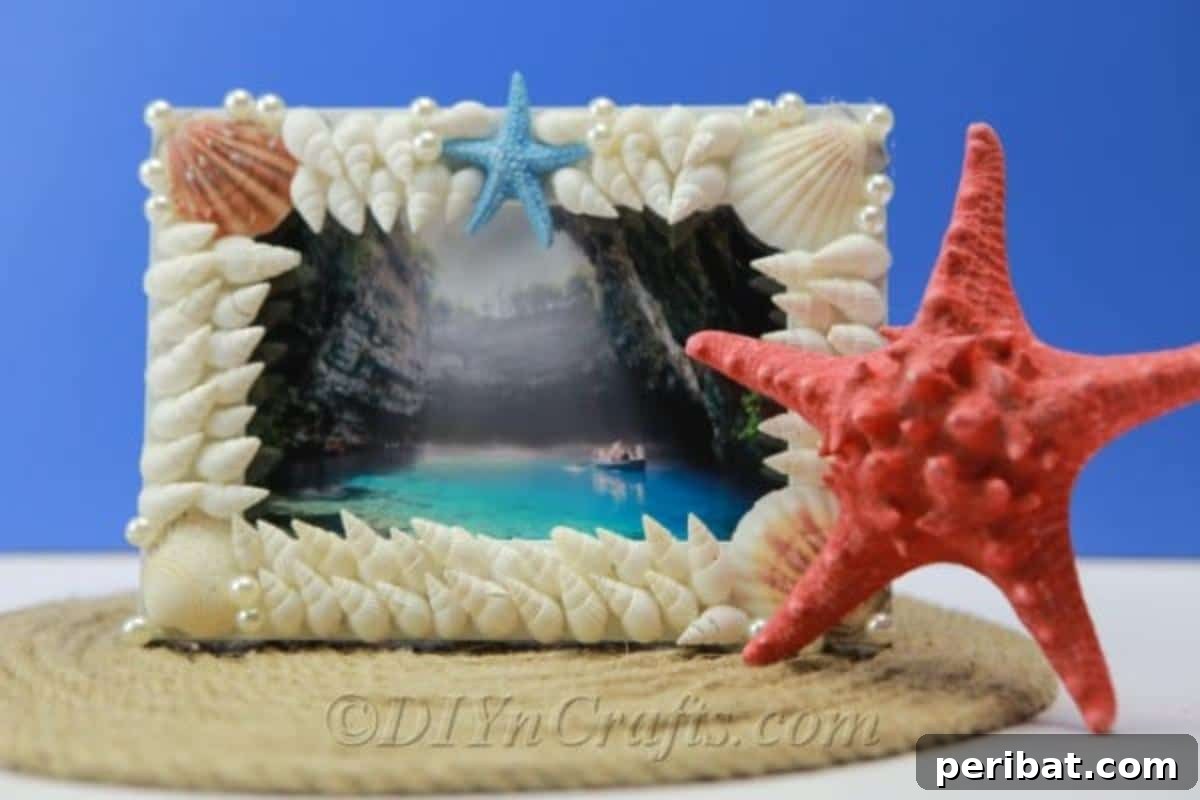 Shell covered frame with a red starfish on the side 