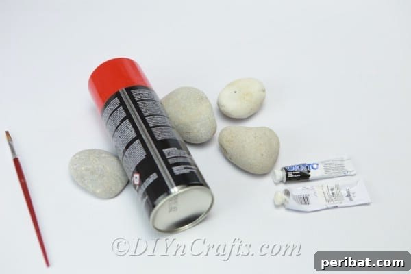 Rocks, paint and other supplies needed to paint ladybug rocks