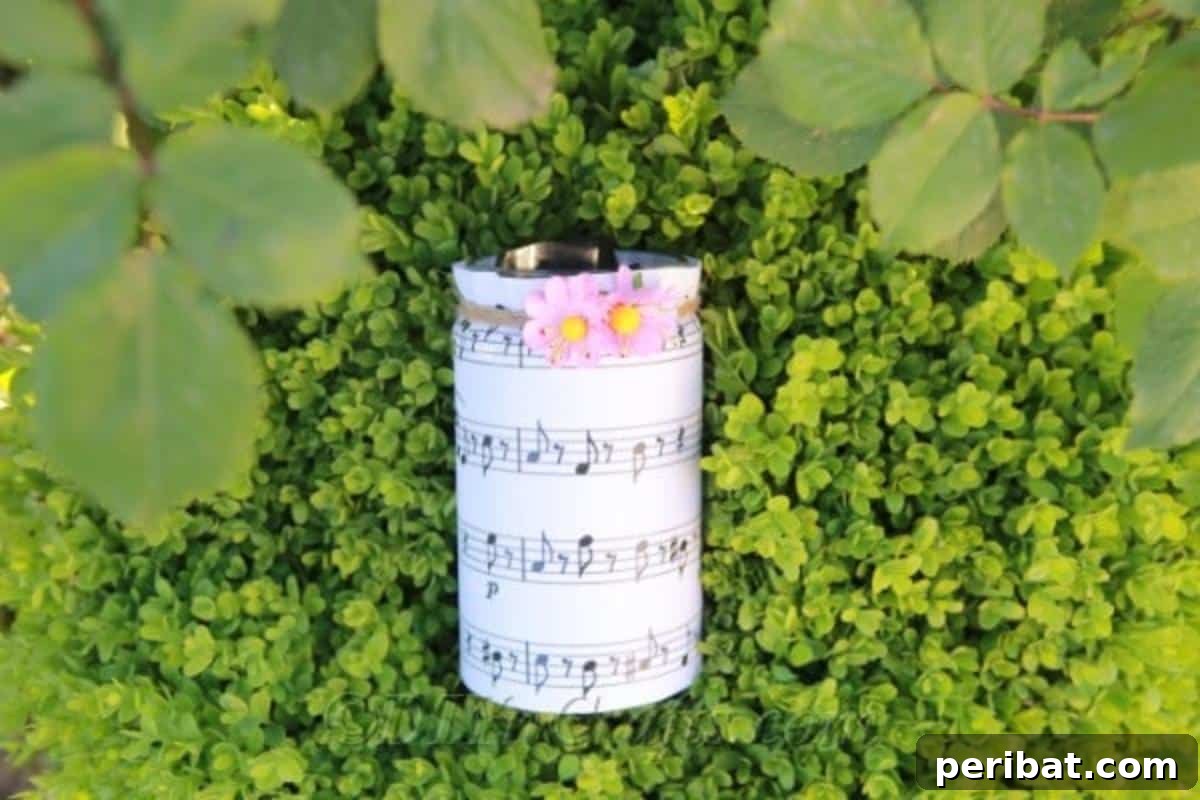Melodic Mason Jar Craft 3 Jar with sheet music in grass, showcasing natural light