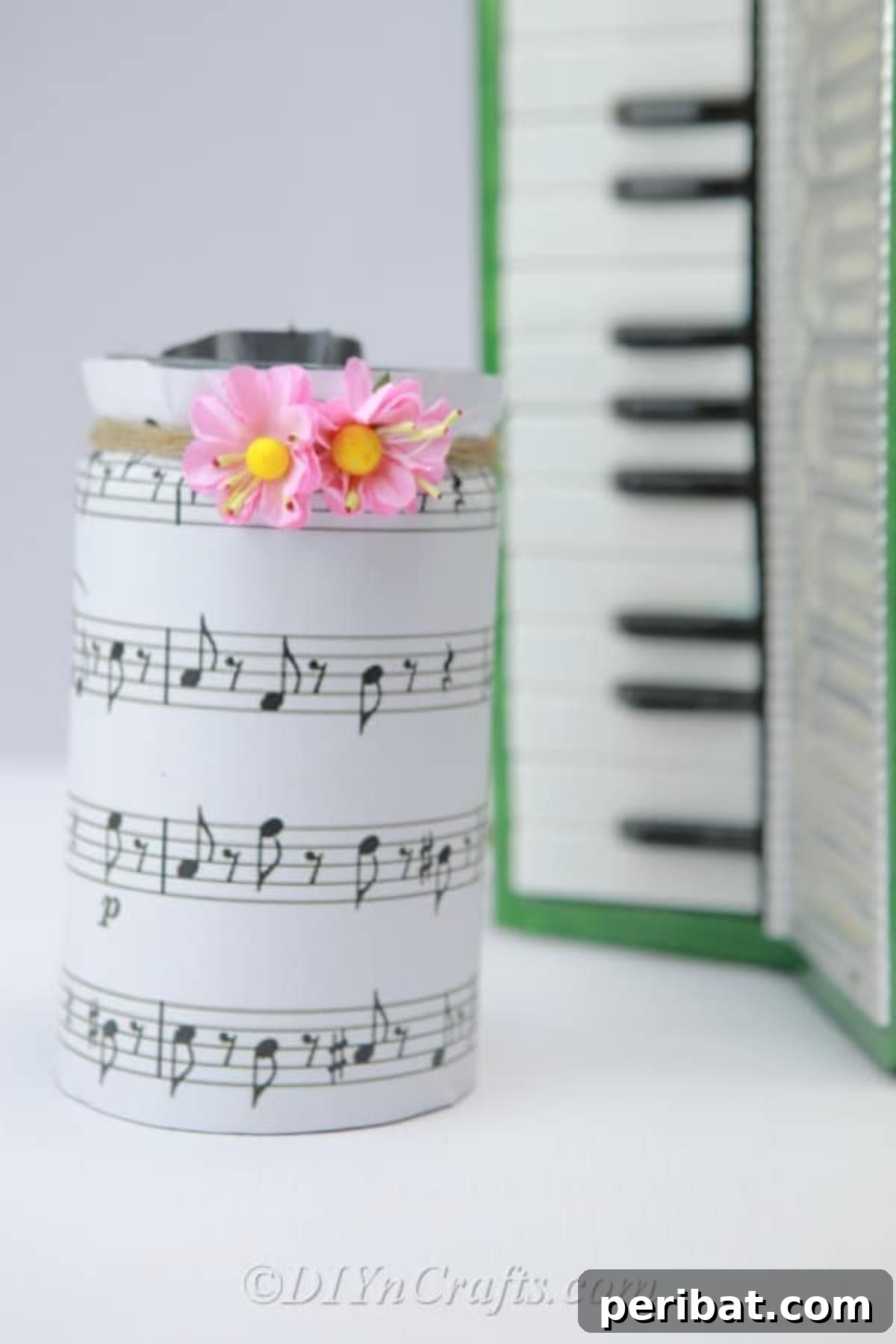 Melodic Mason Jar Craft 4 Music sheet jar beside piano, highlighting its placement in a musical setting