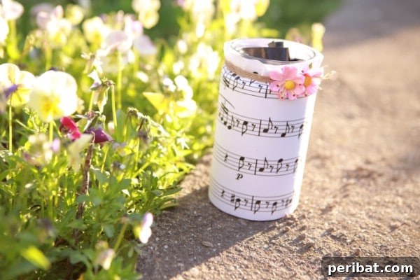 How To Make A Decorative Sheet Music Jar - A finished music sheet jar with delicate decorations