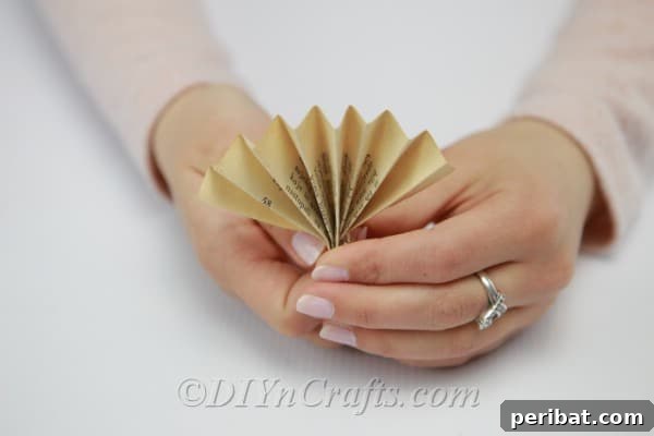 Literary Angel Wings Decor 19 A decorative fan made from folded old book pages