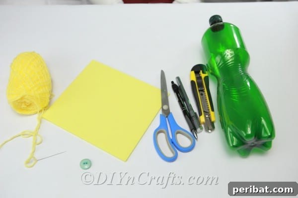 Green soda bottle bottom paired with yellow craft foam, ready for the turtle craft project.