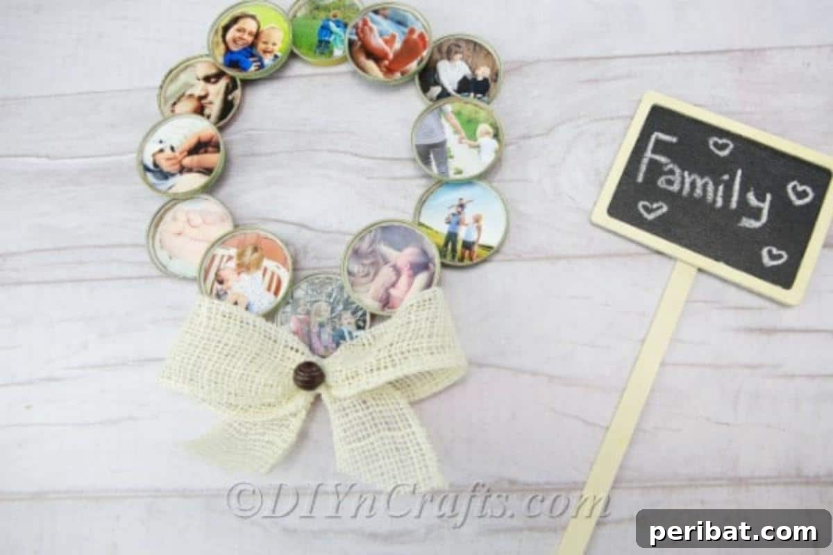 A completed DIY photo wreath resting on a rustic wooden table beside a vintage chalkboard sign, highlighting its charm as personalized home decor.