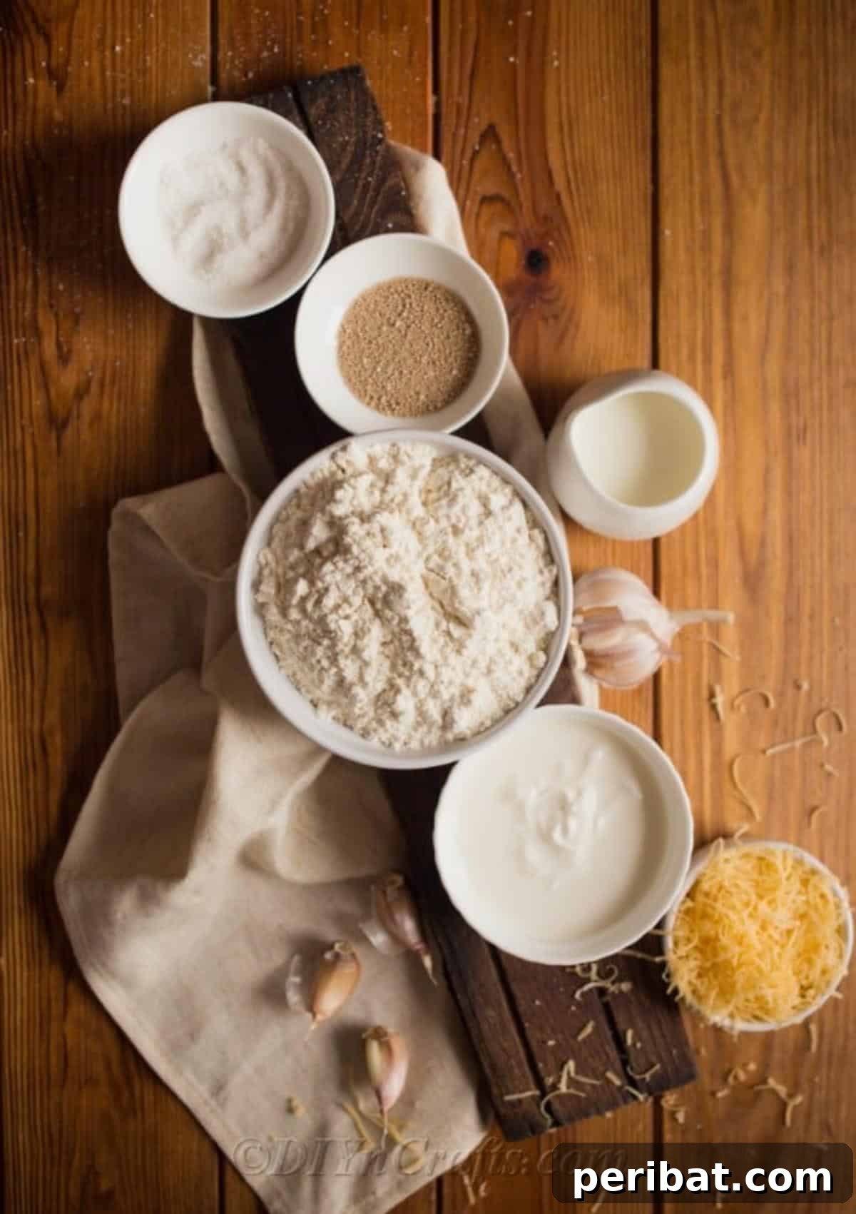 Ingredients needed to make Hungarian langos: flour, yeast, milk, oil, salt, and sugar