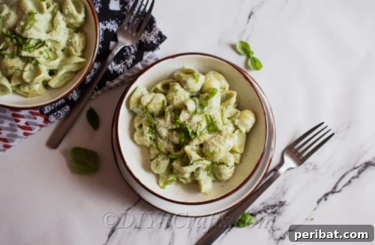 Pasta shells coated in blue cheese sauce, ready for a unique and flavorful meal